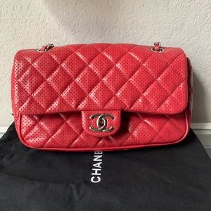 CHANEL Punch flap bag quilted perforated lambskin
